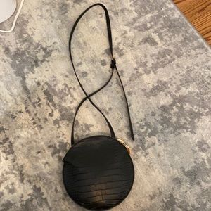Black circle crossbody purse
